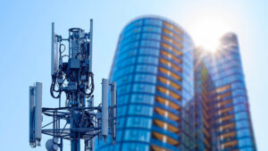 A 5G and mobile communications tower in a smart city, delivering cloud computing at the edge