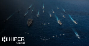 A military fleet with aircraft carriers and destroyers on the water, and jets flying overhead - including the HIPER Global logo
