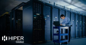 An engineer repairing a server in a data centre - including the HIPER Global logo